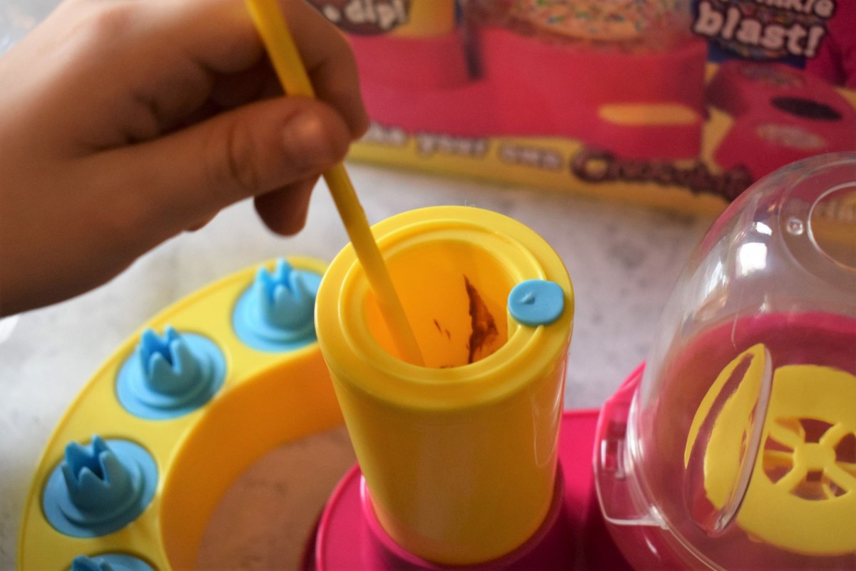 Mixing the chocolate to melt Chocolate Sprinkle Stix