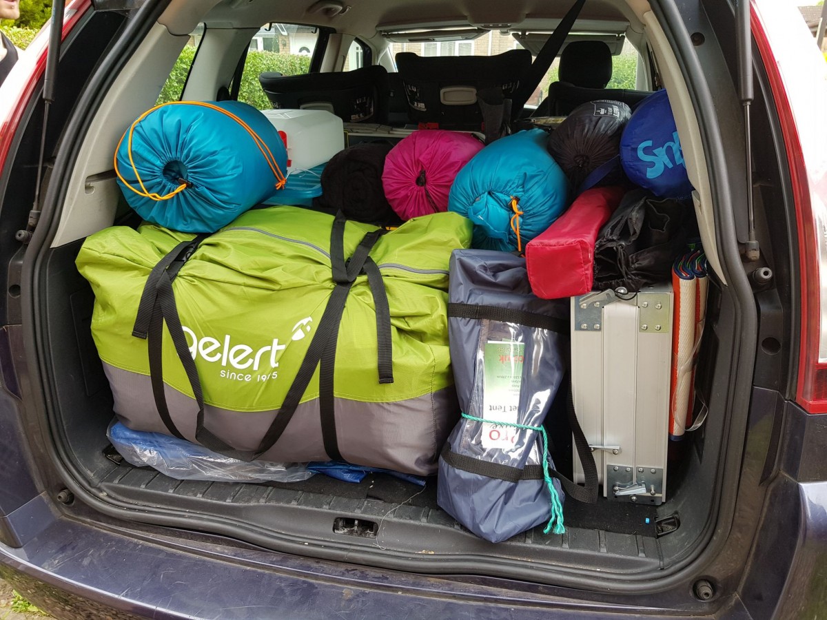 Car boot full of camping gear