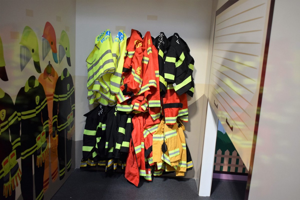 photo showing the fire role play outfits at safari play adventure